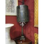 A bronzed neo-classical lamp base in the Empire style with a marbled lamp shade, 99.