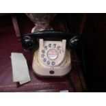 A vintage Belgian dial telephone with paperwork