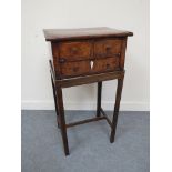 A Georgian walnut sewing table on later stand, 76.