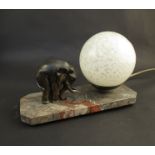 An Art Deco desk lamp with bronze elephant surmounted on marble base,