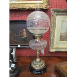 A Victorian oil lamp with a fine quality deep cut lead crystal font,