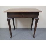 A Georgian oak hall table with single drawer tapering legs to pad feet, 78.