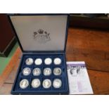 A set of 24 silver proof coins commemorating the eightieth birthday of Her Majesty Queen