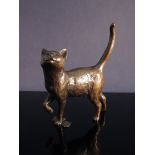 A limited edition solid bronzed figure of a cat,