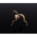 A miniature solid bronze whippet,