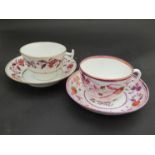 A 19th Century pink lustre cup and saucer and a 19th Century deep pink floral cup and saucer,