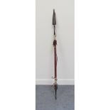 An African spear with leather covered shaft and scabbard