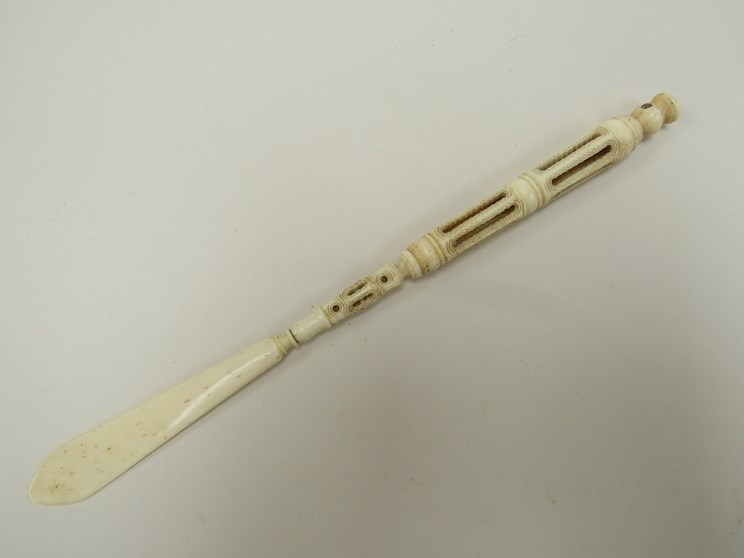 A bone Stanhope letter opener showing Isle of Wight J Lord fancy repository and Temperance Hotel