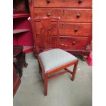 A 19th Century oak side chair with pierced back,