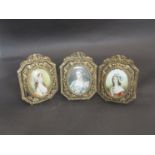 Three 19th Century miniatures of elegant ladies with brass pierced foliate frames