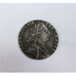 A George III 1787 shilling,