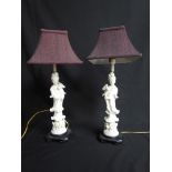 A pair of blanc-de-chine figural lamps
