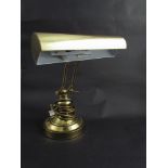 A brass desk lamp