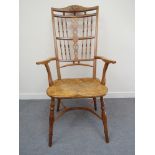 A "Tim Whiting" 21st Century high back yew wood Mendlesham elbow chair with burr elm dished seat on