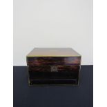 A Victorian coromandel ladies vanity box with fitted interior and contents,