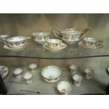 A Victorian coffee and tea set, white ground with gilt foliate design and roses including teapot,