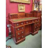 A Victorian mahogany writing desk green leather insert top with two single drawers, galleried back,
