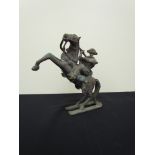 An Etruscan bronze figure of Amazonian warrior on horse back, 23cm long x 21.