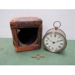 An early 20th Century metal cased marine clock in worn leather carry case,