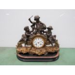 A 19th Century French figural mantel clock with three bronzed spelter cherub musicians,