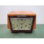 An Art Deco period mantel clock in walnut, satinwood and rosewood case,