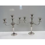 A pair of Walker & Hall silver plated three branch candelabrum,