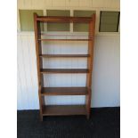 A Robert 'Mouseman' Thompson of Kilburn oak tall bookcase with open back.