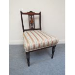 An Edwardian bedroom chair with classical inlaid back,