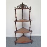 A Victorian mahogany four tier wot-not,