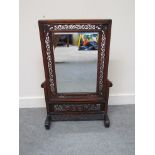 A Chinese elm table screen with slide out mirror,