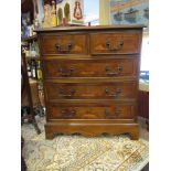 A George III style chest of small proportions with inlaid decoration,