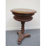 A Victorian walnut sewing table,