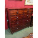 A Victorian mahogany two over three chest of drawers on bun feet