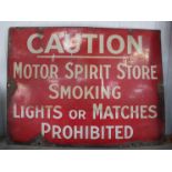 An enamel caution sign "Motor Sprit Store, Smoking,