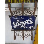 A double sided enamelled sign "Best of all Singer cycles" mounted on a wrought iron frame