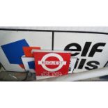 Request Bus Stop sign and two Elf oils signs