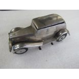 A chromed cigarette dispenser in the form of a vintage car a/f