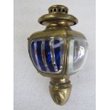 A brass lamp stamped 176N