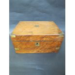 A 19th century walnut writing box with brass mounts,