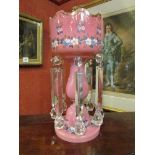 A near pair of Victorian pink glass lustre's hand painted floral detail,