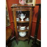 A late 19th Century walnut French Vitrine with ornate ormulu mounts,