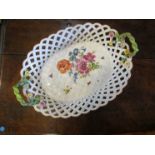 A 19th Century Meissen marked porcelain lattice weave basket with floral embellishment,