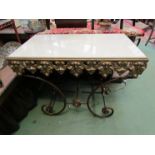 A late 19th Century ornate butchers table with marble top, metal base,