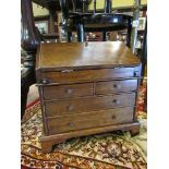 A Georgian style miniature oak bureau,