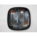 A modernist 60's Italian ceramic plate of rounded square form,