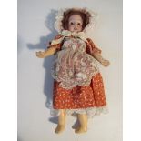 An 11" "Racnagal" doll