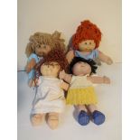 Four cabbage patch dolls