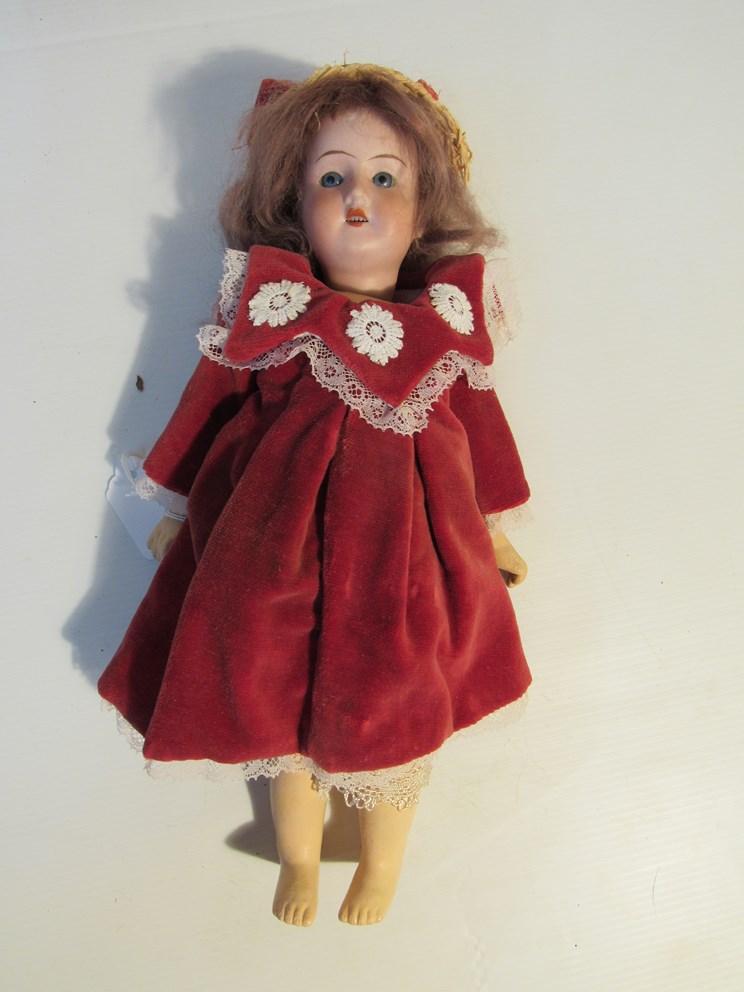 A 15" bisque head "Racnagal" doll