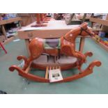 A Judy Ferguson design rocking horse "Trojan" with certificate