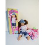 A Smoby Roxanne doll dressed plus two outfits - boxed